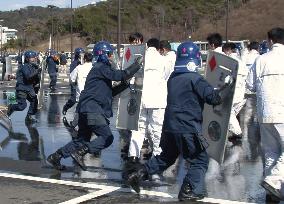 Shizuoka police conduct drills on combating soccer hooligans